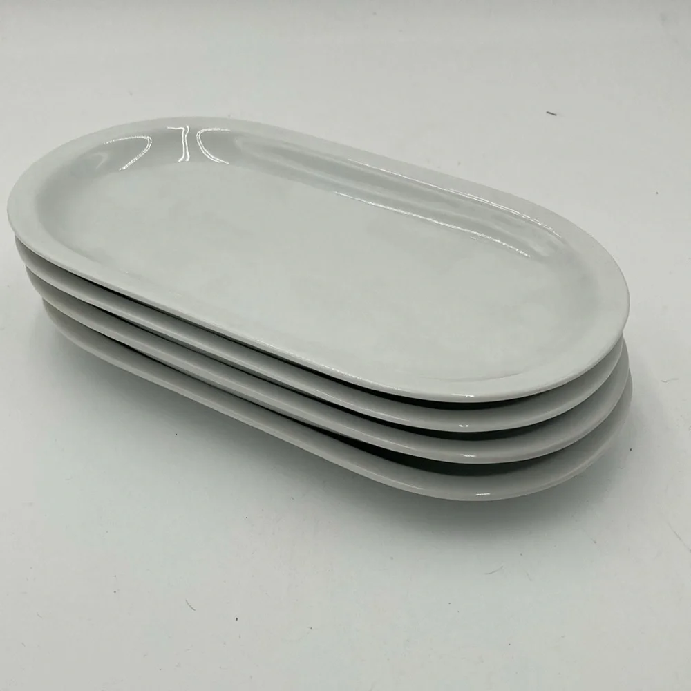 Crate & Barrel Stadium Oval White Ware Ceramic Plates